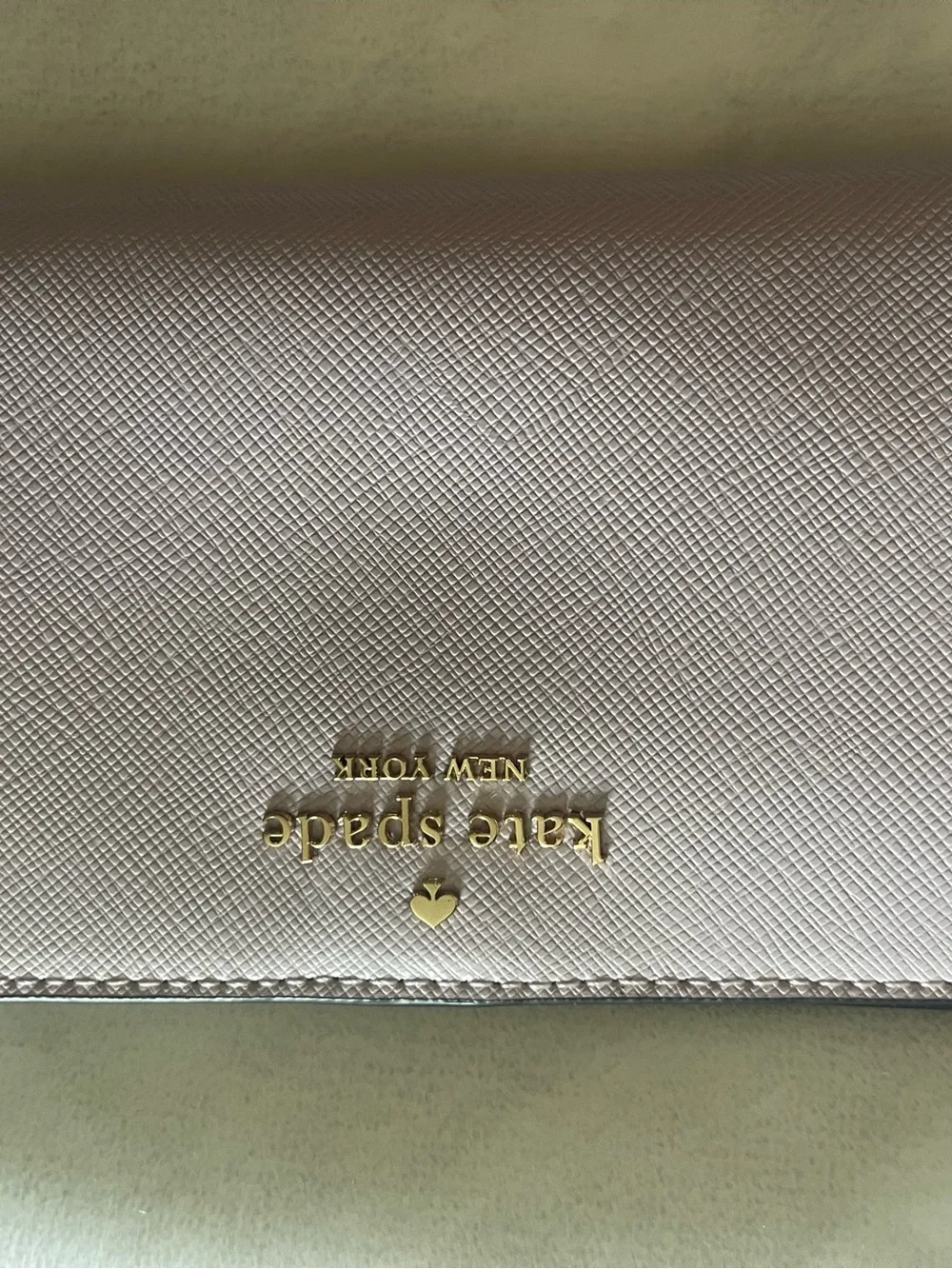 kate spade light pink saffiano leather wallet with gold logo